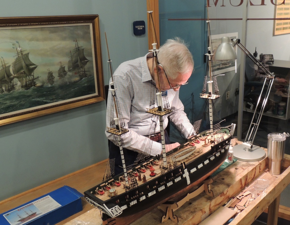 Model shipbuilder at Naval Museum