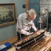 Model shipbuilder at Naval Museum