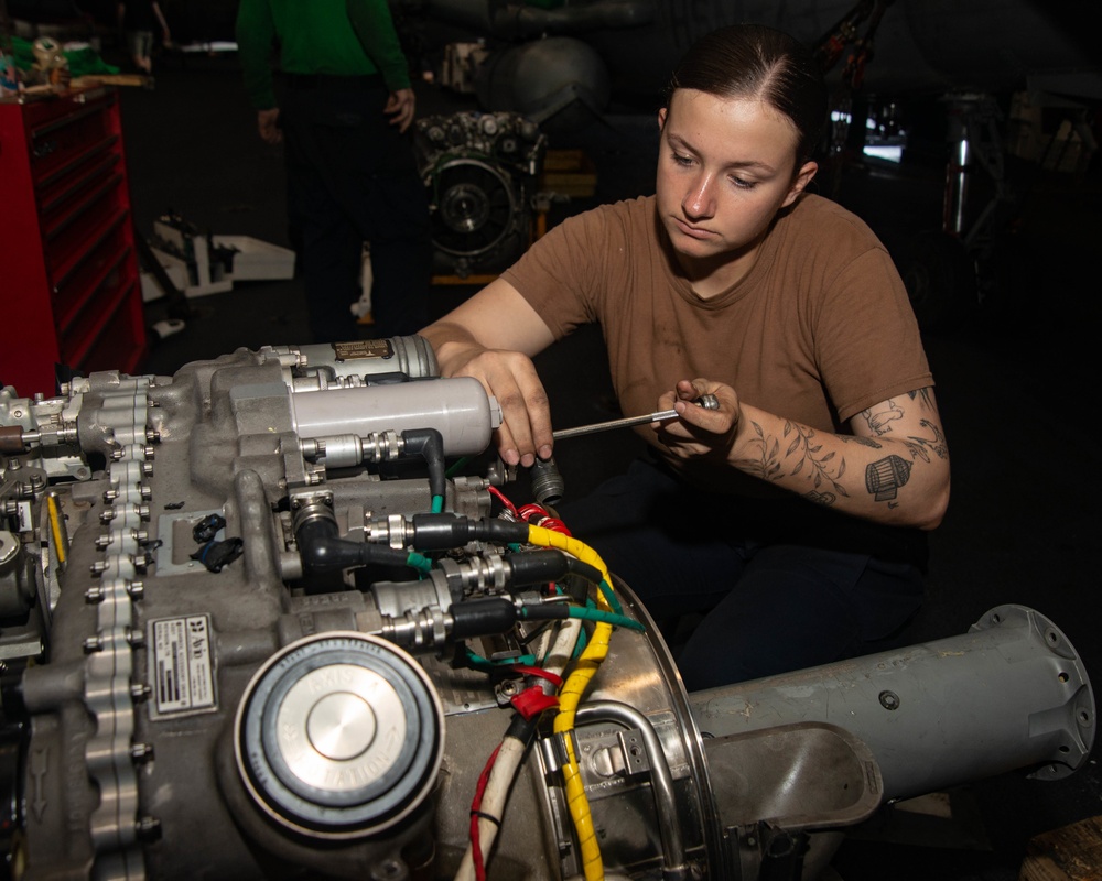 Sailor Prepares Helicopter Engine For Replacement