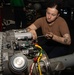 Sailor Prepares Helicopter Engine For Replacement