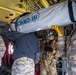 A US Army CH-47 Chinook is loaded with humanitarian aid supplies