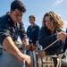 USS Paul Hamilton Sailors Set Fueling Hose