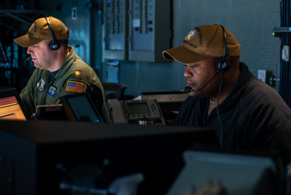 Sailors Stand Watch In The Tactical Flag Communication Center