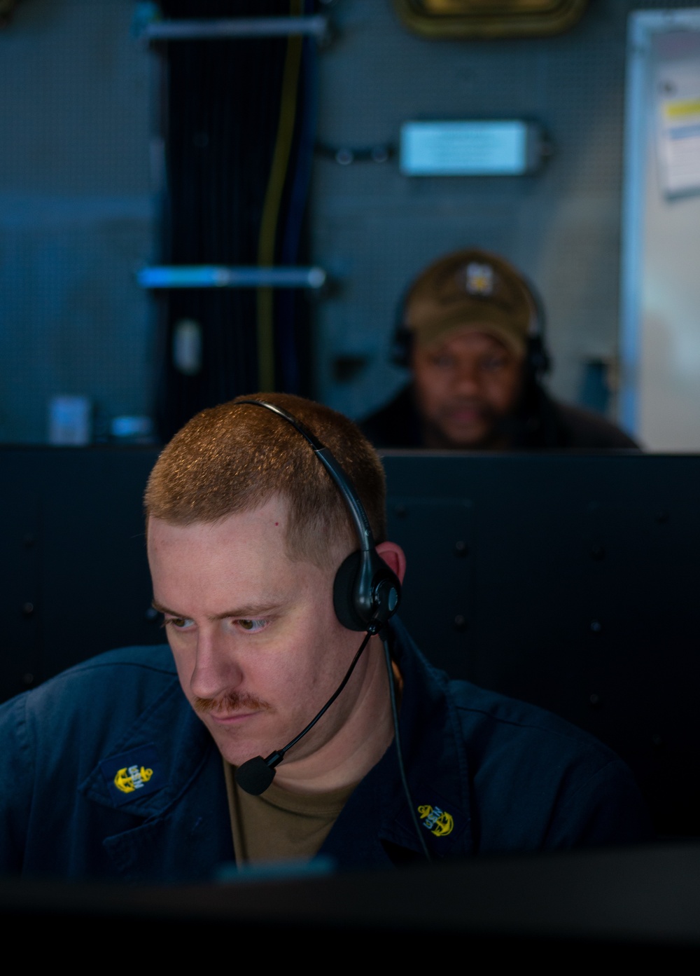 Sailors Stand Watch In The Tactical Flag Communication Center