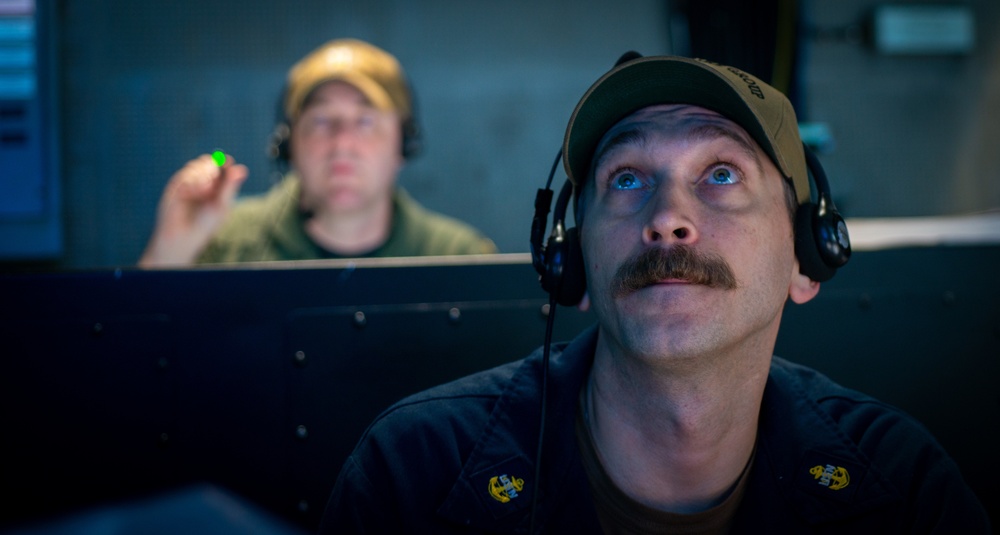 Sailors Stand Watch In The Tactical Flag Communication Center