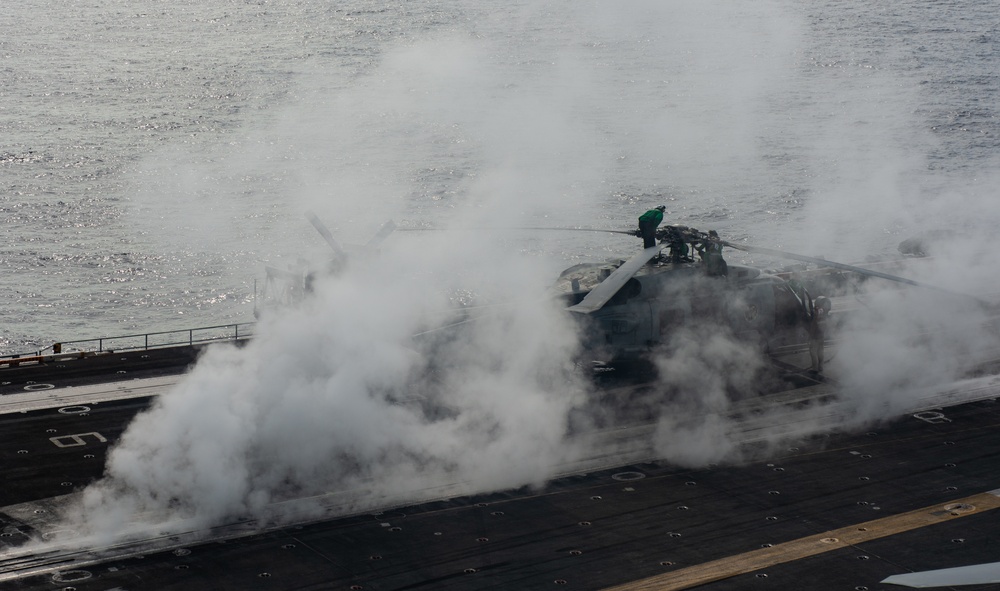 Sailors Conduct Routine Maintenance On Aircraft