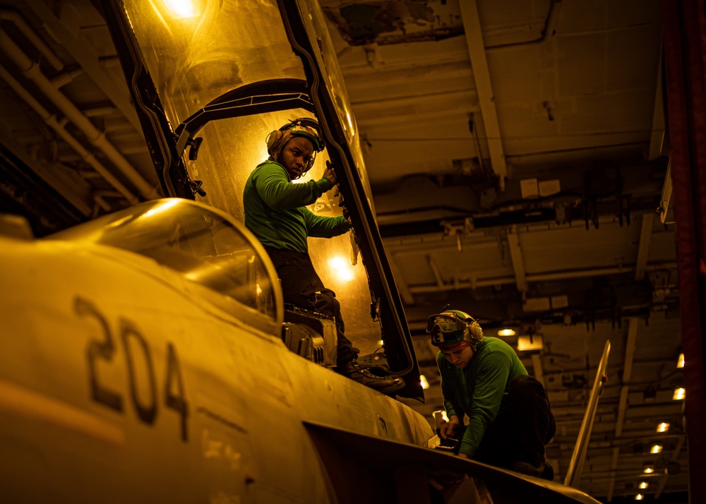 Sailors Conduct Routine Maintenance