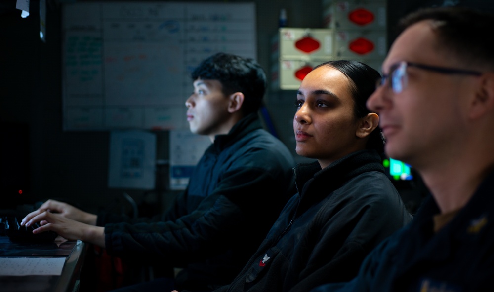 Sailors Stand Watch In The Tactical Flag Communication Center