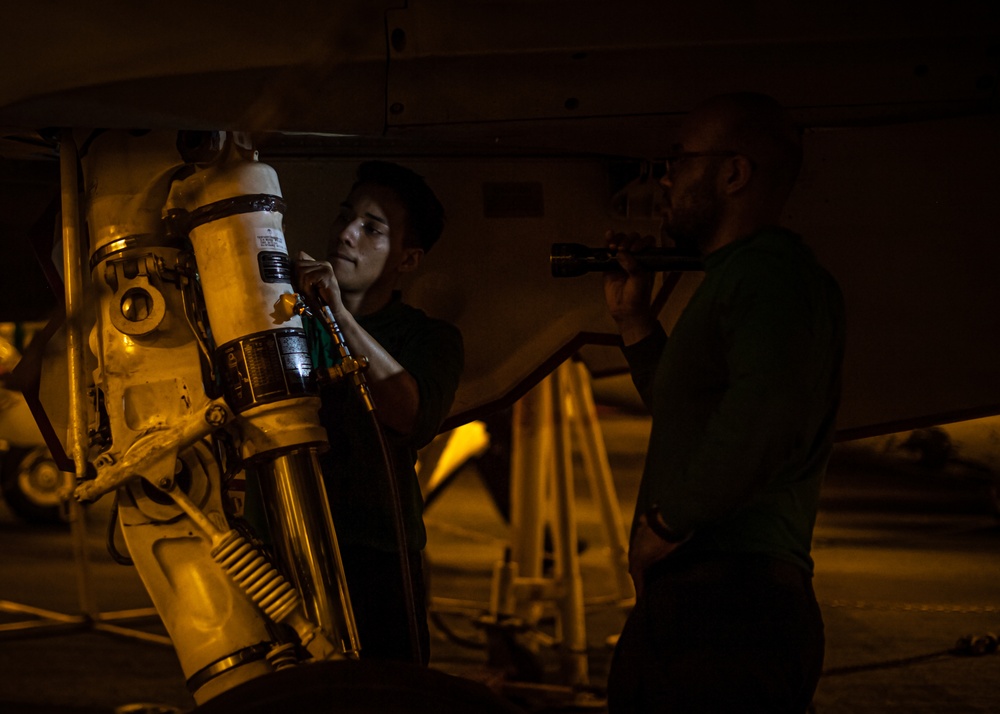 Sailors Conduct Maintenance On Aircraft