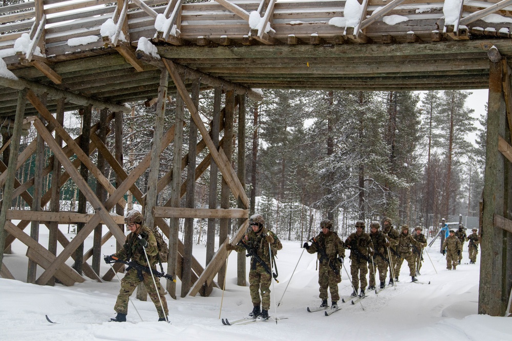 Charlie Troop, 3-71 Cavalry Regiment, 1BCT, 10th Mountain Division conduct firing positions on skis and squad tactics training during Exercise Arctic Forge '23 on Feb. 19, 2023