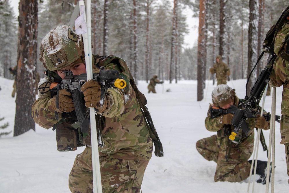 Charlie Troop, 3-71 Cavalry Regiment, 1BCT, 10th Mountain Division conduct firing positions on skis and squad tactics training during Exercise Arctic Forge '23 on Feb. 19, 2023