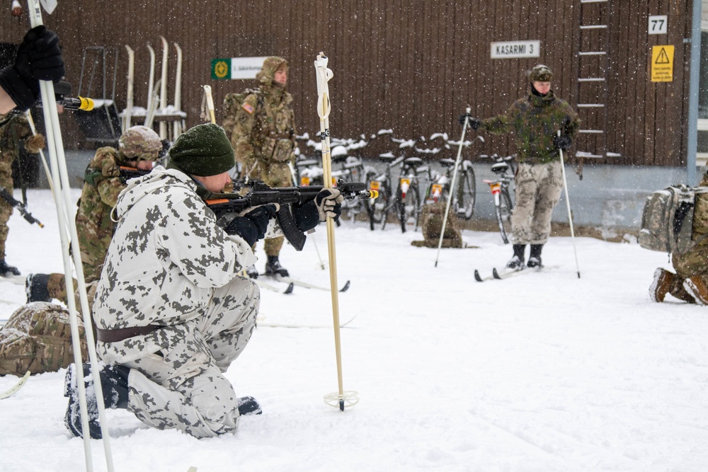 Charlie Troop, 3-71 Cavalry Regiment, 1BCT, 10th Mountain Division conduct firing positions on skis and squad tactics training during Exercise Arctic Forge '23 on Feb. 19, 2023