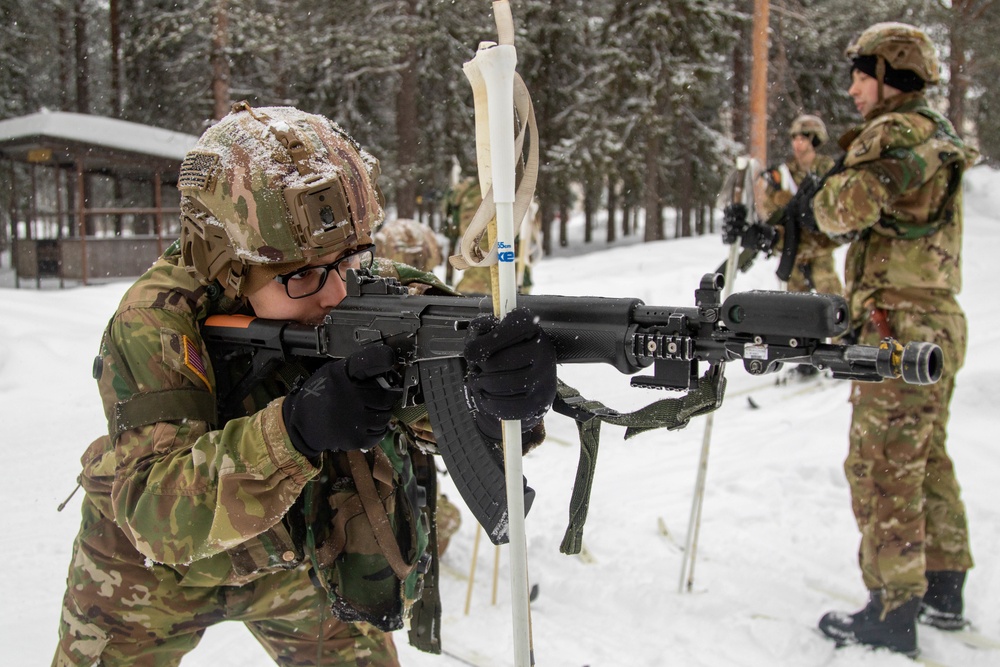 Charlie Troop, 3-71 Cavalry Regiment, 1BCT, 10th Mountain Division conduct firing positions on skis and squad tactics training during Exercise Arctic Forge '23 on Feb. 19, 2023