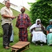 Members of USCGC Spencer (WMEC 905) celebrate Ensign Mohammad Diakite’s homecoming at his family’s home in Côte d’Ivoire