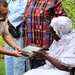Members of USCGC Spencer (WMEC 905) celebrate Ensign Mohammad Diakite’s homecoming at his family’s home in Côte d’Ivoire