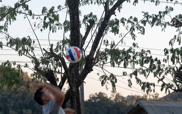 DPAA members play volleyball with local community