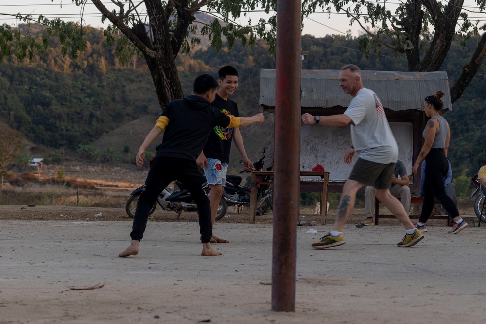 DPAA members play volleyball with local community