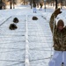 Charlie Troop, 3-71 Cavalry Regiment, 1BCT, 10th Mountain Division train with Finnish soldiers on a ski obstacle course during Defense Exercise North in Sodankyla Garrison, Finland, during Exercise Arctic Forge '23 on Feb. 21, 2023