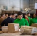 U.S. Navy Sailors Sort Mail During A Replenishment-At-Sea