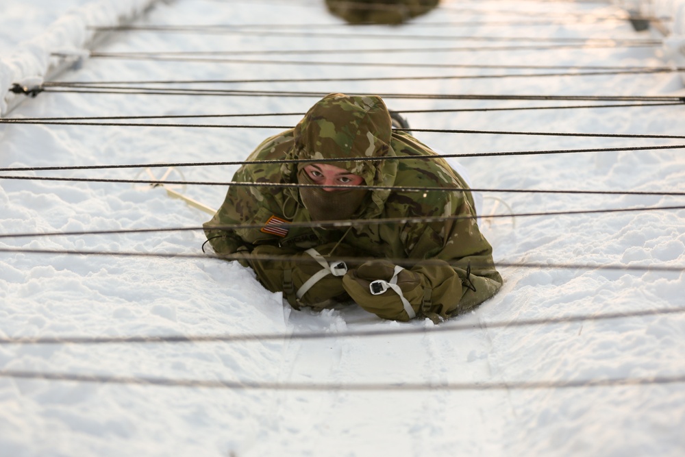 Charlie Troop, 3-71 Cavalry Regiment, 1BCT, 10th Mountain Division train with Finnish soldiers on a ski obstacle course during Defense Exercise North in Sodankyla Garrison, Finland, during Exercise Arctic Forge '23 on Feb. 21, 2023