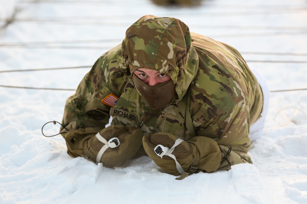 Charlie Troop, 3-71 Cavalry Regiment, 1BCT, 10th Mountain Division train with Finnish soldiers on a ski obstacle course during Defense Exercise North in Sodankyla Garrison, Finland, during Exercise Arctic Forge '23 on Feb. 21, 2023