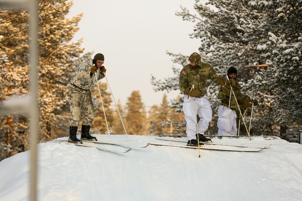 Charlie Troop, 3-71 Cavalry Regiment, 1BCT, 10th Mountain Division train with Finnish soldiers on a ski obstacle course during Defense Exercise North in Sodankyla Garrison, Finland, during Exercise Arctic Forge '23 on Feb. 21, 2023