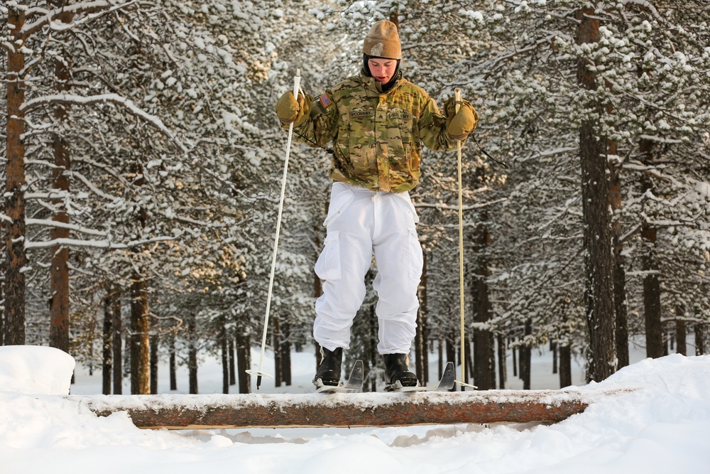 Charlie Troop, 3-71 Cavalry Regiment, 1BCT, 10th Mountain Division train with Finnish soldiers on a ski obstacle course during Defense Exercise North in Sodankyla Garrison, Finland, during Exercise Arctic Forge '23 on Feb. 21, 2023