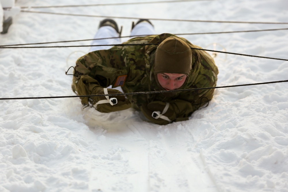 Charlie Troop, 3-71 Cavalry Regiment, 1BCT, 10th Mountain Division train with Finnish soldiers on a ski obstacle course during Defense Exercise North in Sodankyla Garrison, Finland, during Exercise Arctic Forge '23 on Feb. 21, 2023