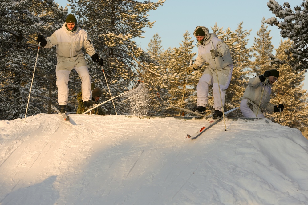 Charlie Troop, 3-71 Cavalry Regiment, 1BCT, 10th Mountain Division train with Finnish soldiers on a ski obstacle course during Defense Exercise North in Sodankyla Garrison, Finland, during Exercise Arctic Forge '23 on Feb. 21, 2023