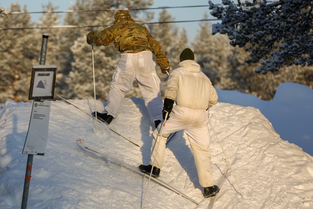 Charlie Troop, 3-71 Cavalry Regiment, 1BCT, 10th Mountain Division train with Finnish soldiers on a ski obstacle course during Defense Exercise North in Sodankyla Garrison, Finland, during Exercise Arctic Forge '23 on Feb. 21, 2023