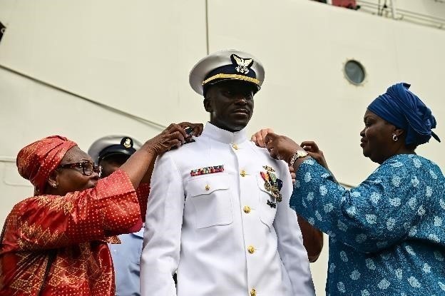 Ensign Mohammad Diakite promotes to Lt.j.g with his family in attendance in Abidjan, Côte d’Ivoire