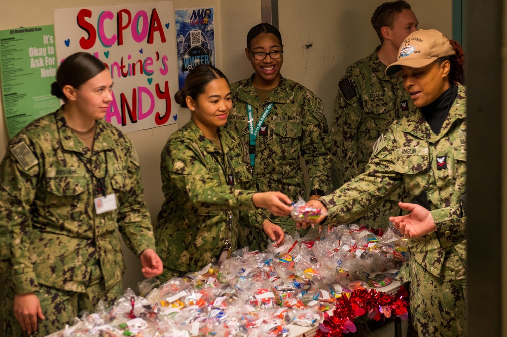 Sailors give out candy