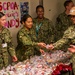 Sailors give out candy