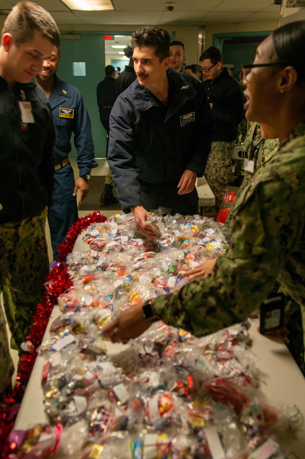 Sailors give out candy