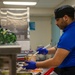 Sailor serving food