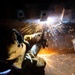 Contractor welds aboard the USS John C. Stennis