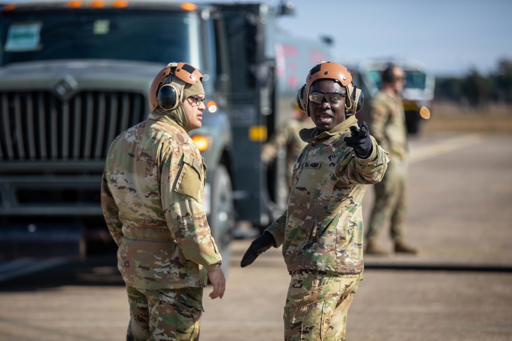 U.S. Army Sgt. Directs his Soldier during rapid refuelling procedures