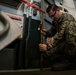 USS Carl Vinson (CVN70) Sailor perform deck maintenance