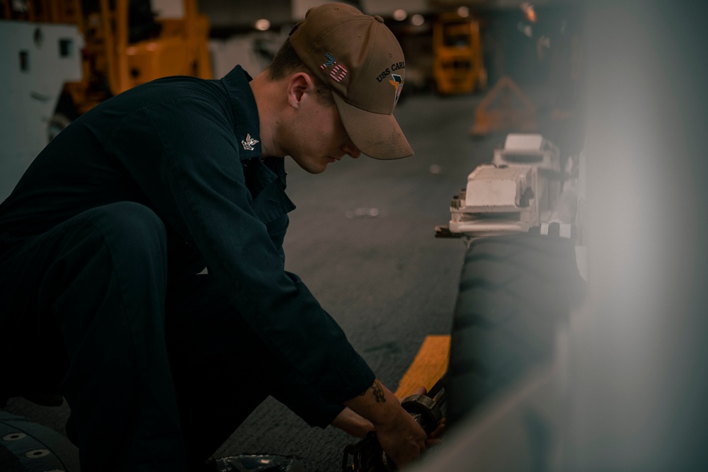 USS Carl Vinson (CVN70)  Sailors prepare for deck maintenance