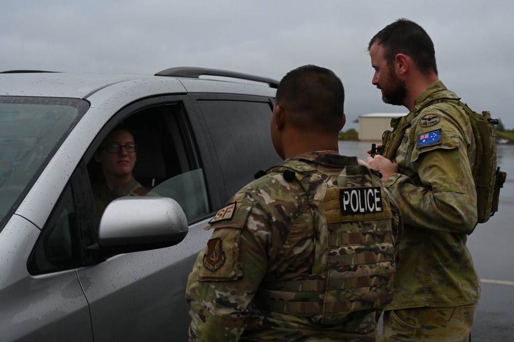 USAF and RAAF members maintain gate security at Palau International Airport