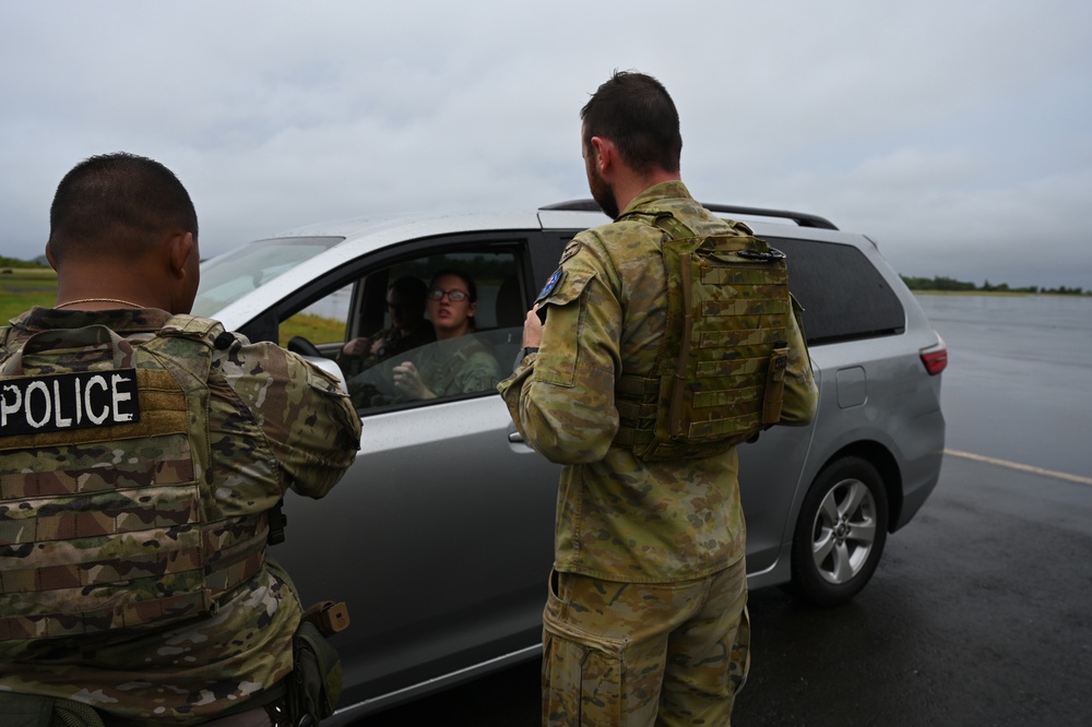 USAF and RAAF members maintain gate security at Palau International Airport