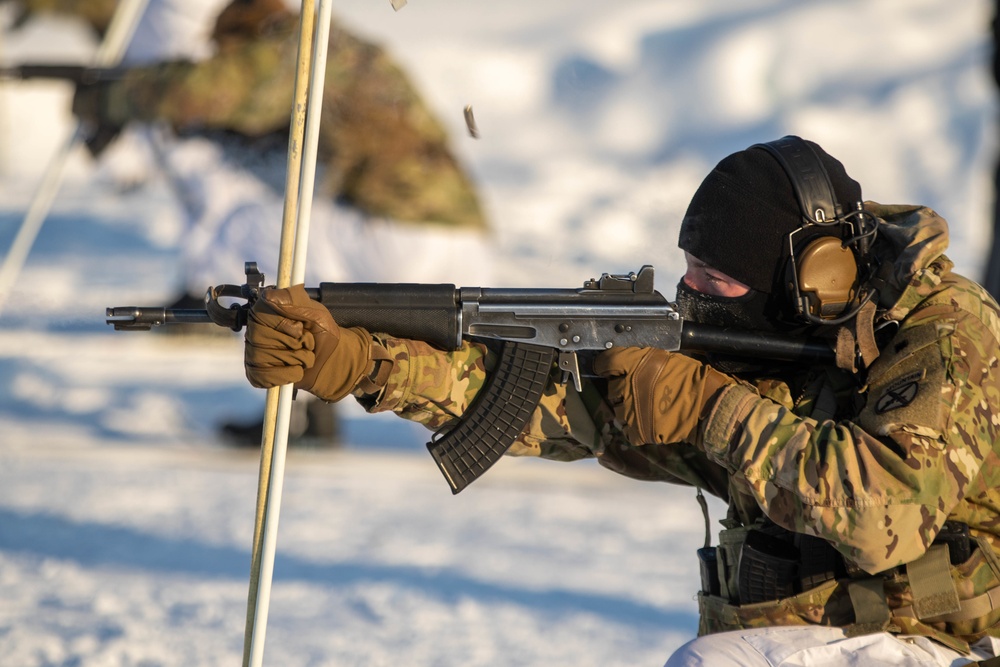 3-71 Cavalry Regiment, 1BCT, 10th Mountain Division train with Finnish soldiers on weapons proficiency using Finland’s RK62 assault rifle during Defense Exercise North in Sodankyla Garrison, Finland, during Exercise Arctic Forge '23 on Feb. 22, 2023