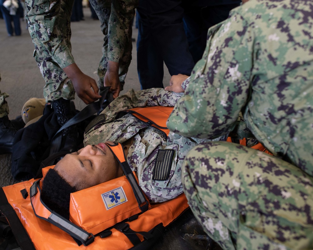 USS Carl Vinson (CVN-70) Sailor Participates in General Quarters Drill