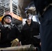 USS Carl Vinson (CVN-70) Sailor Participates In Pipe Patching