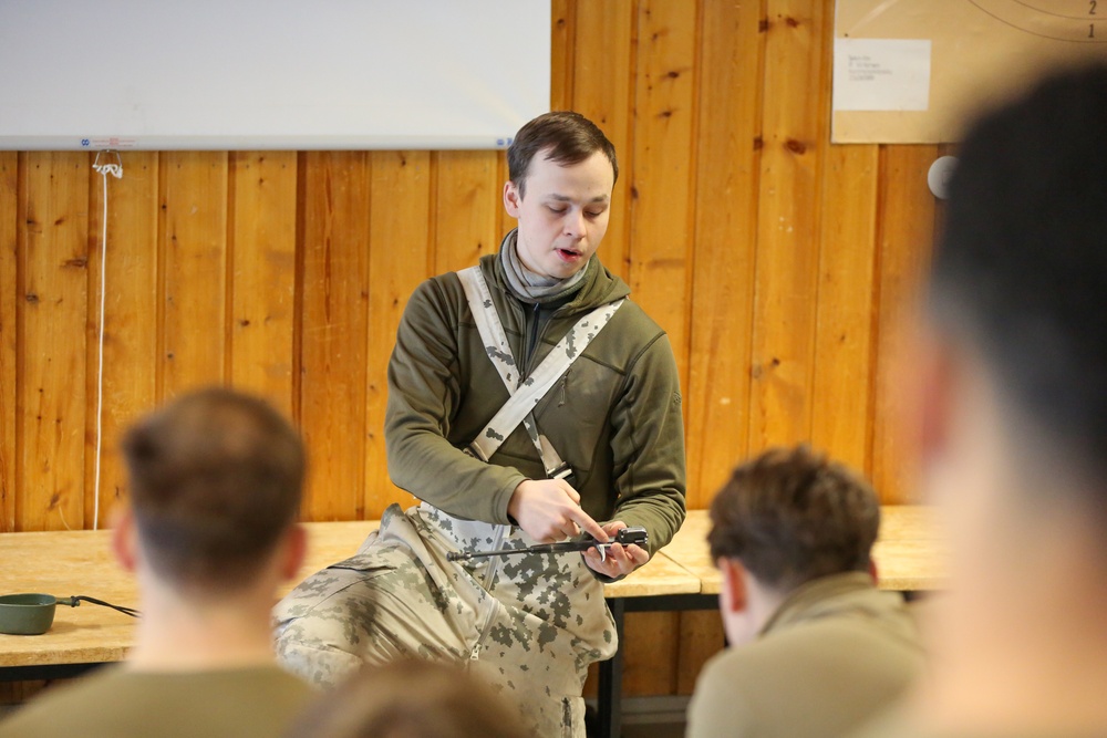 3-71 Cavalry Regiment, 1BCT, 10th Mountain Division train with Finnish soldiers on weapons proficiency using Finland’s RK62 assault rifle during Defense Exercise North in Sodankyla Garrison, Finland, during Exercise Arctic Forge '23 on Feb. 22, 2023