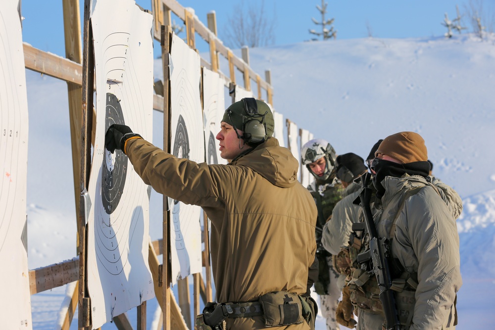 3-71 Cavalry Regiment, 1BCT, 10th Mountain Division train with Finnish soldiers on weapons proficiency using Finland’s RK62 assault rifle during Defense Exercise North in Sodankyla Garrison, Finland, during Exercise Arctic Forge '23 on Feb. 22, 2023