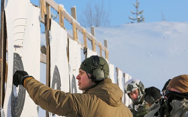 3-71 Cavalry Regiment, 1BCT, 10th Mountain Division train with Finnish soldiers on weapons proficiency using Finland’s RK62 assault rifle during Defense Exercise North in Sodankyla Garrison, Finland, during Exercise Arctic Forge '23 on Feb. 22, 2023