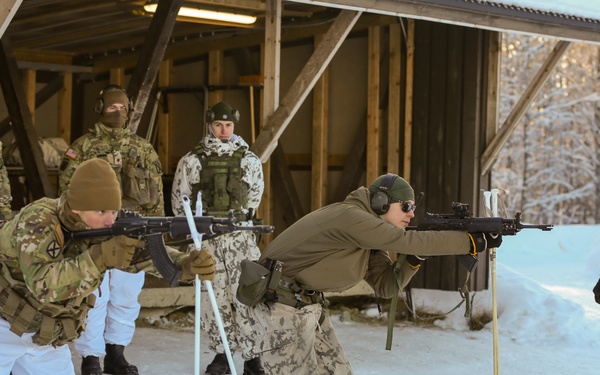 3-71 Cavalry Regiment, 1BCT, 10th Mountain Division train with Finnish soldiers on weapons proficiency using Finland’s RK62 assault rifle during Defense Exercise North in Sodankyla Garrison, Finland, during Exercise Arctic Forge '23 on Feb. 22, 2023
