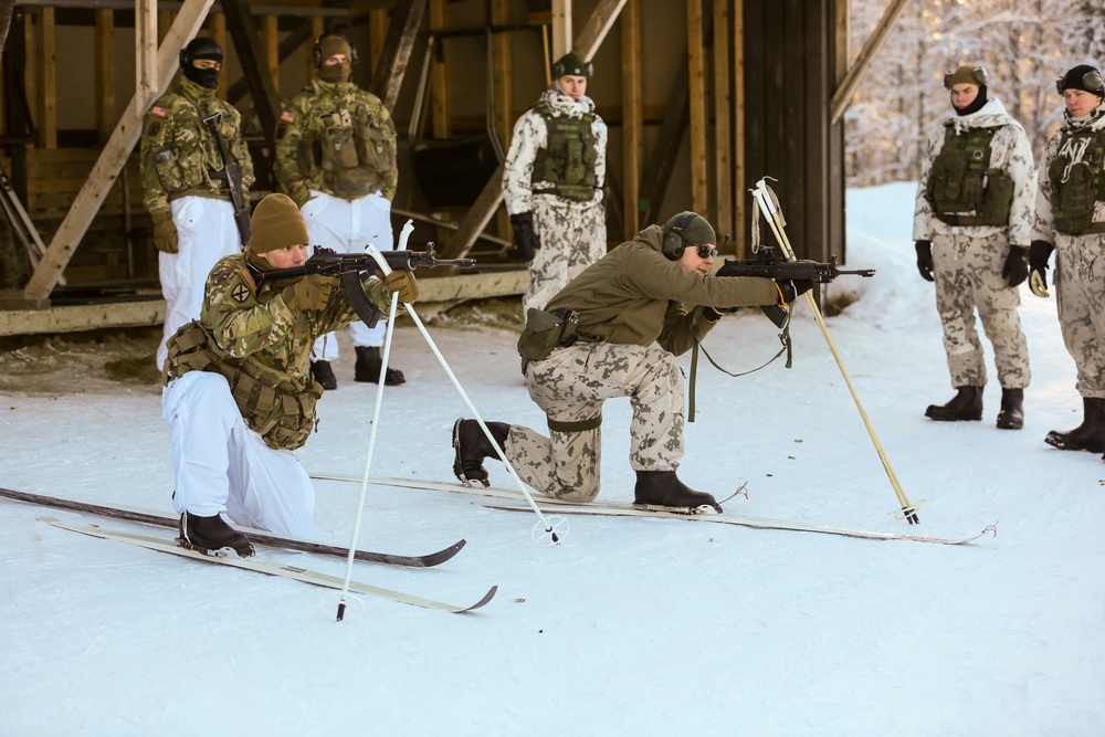 3-71 Cavalry Regiment, 1BCT, 10th Mountain Division train with Finnish soldiers on weapons proficiency using Finland’s RK62 assault rifle during Defense Exercise North in Sodankyla Garrison, Finland, during Exercise Arctic Forge '23 on Feb. 22, 2023