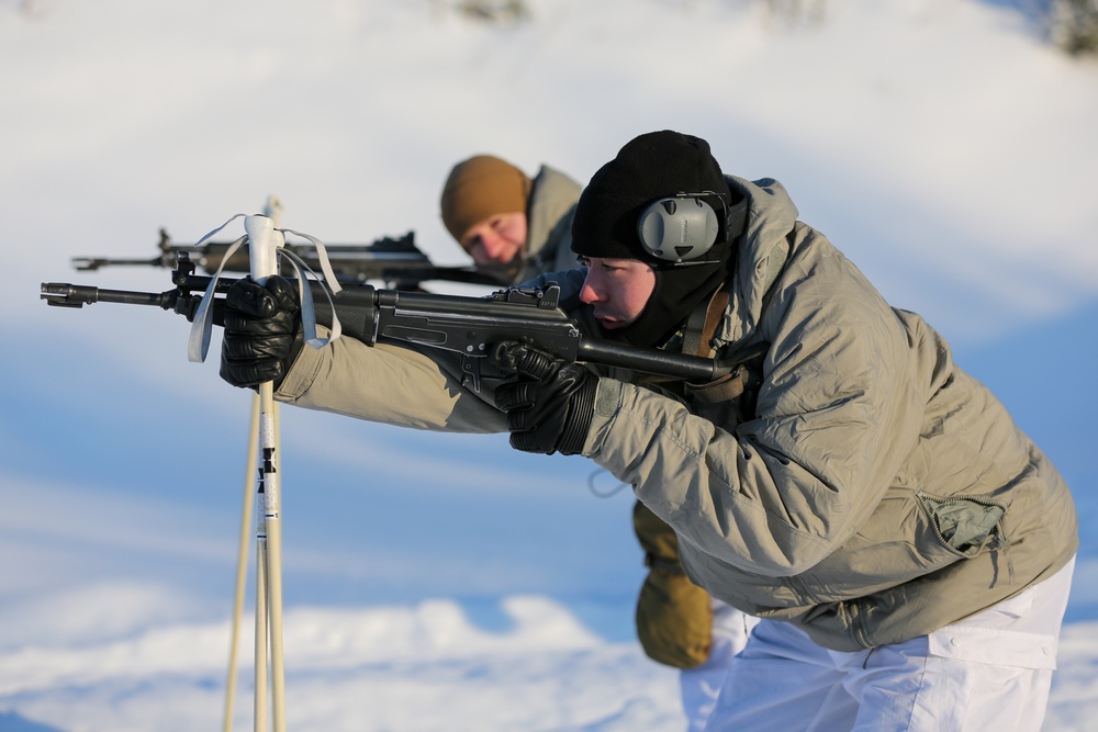 3-71 Cavalry Regiment, 1BCT, 10th Mountain Division train with Finnish soldiers on weapons proficiency using Finland’s RK62 assault rifle during Defense Exercise North in Sodankyla Garrison, Finland, during Exercise Arctic Forge '23 on Feb. 22, 2023